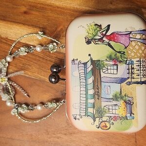 Elegant Illustrated Clutch with Beaded Handle